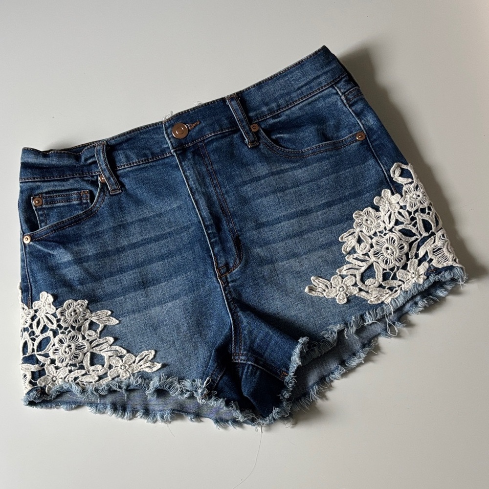 Altar'd State Blue Denim Shorts with White Lace Appliqué